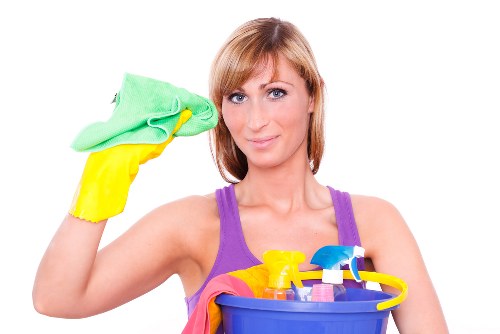 Carpet cleaning professional preparing equipment safely