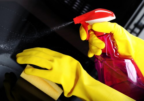 Team member following health and safety procedures during carpet cleaning