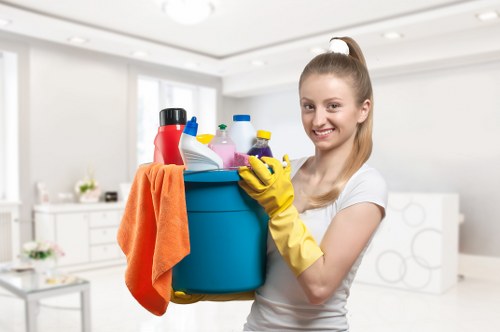 Staff member wearing PPE during a carpet cleaning job
